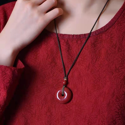 Cinnabar Peace Buckle Necklace